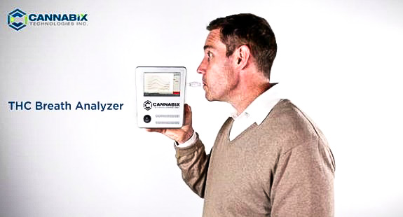 Man breathing into Cannabix THC Breathalyzer.